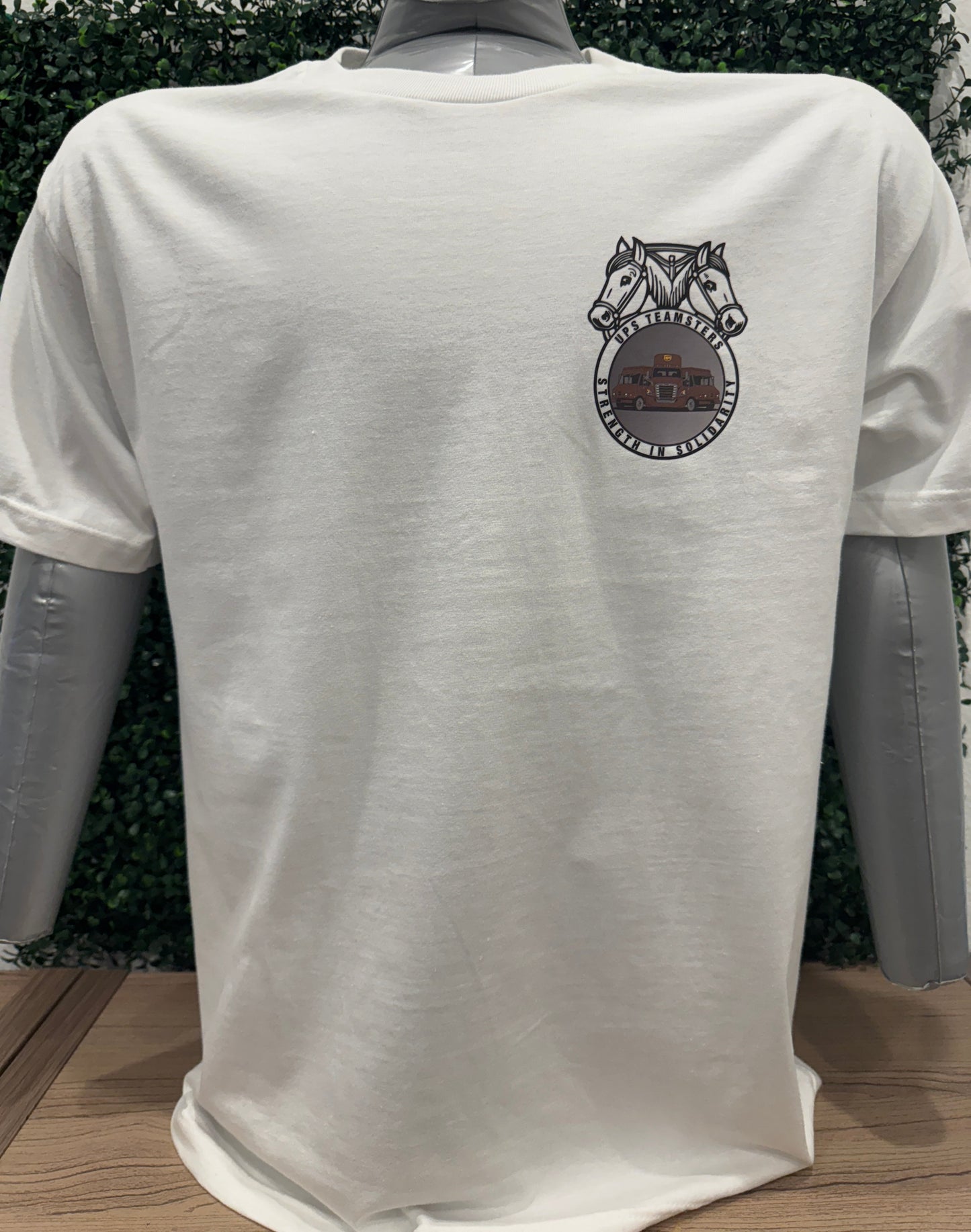 UPS Teamster & Package Car Tee with Teamster logo and UPS Package Car design on display.