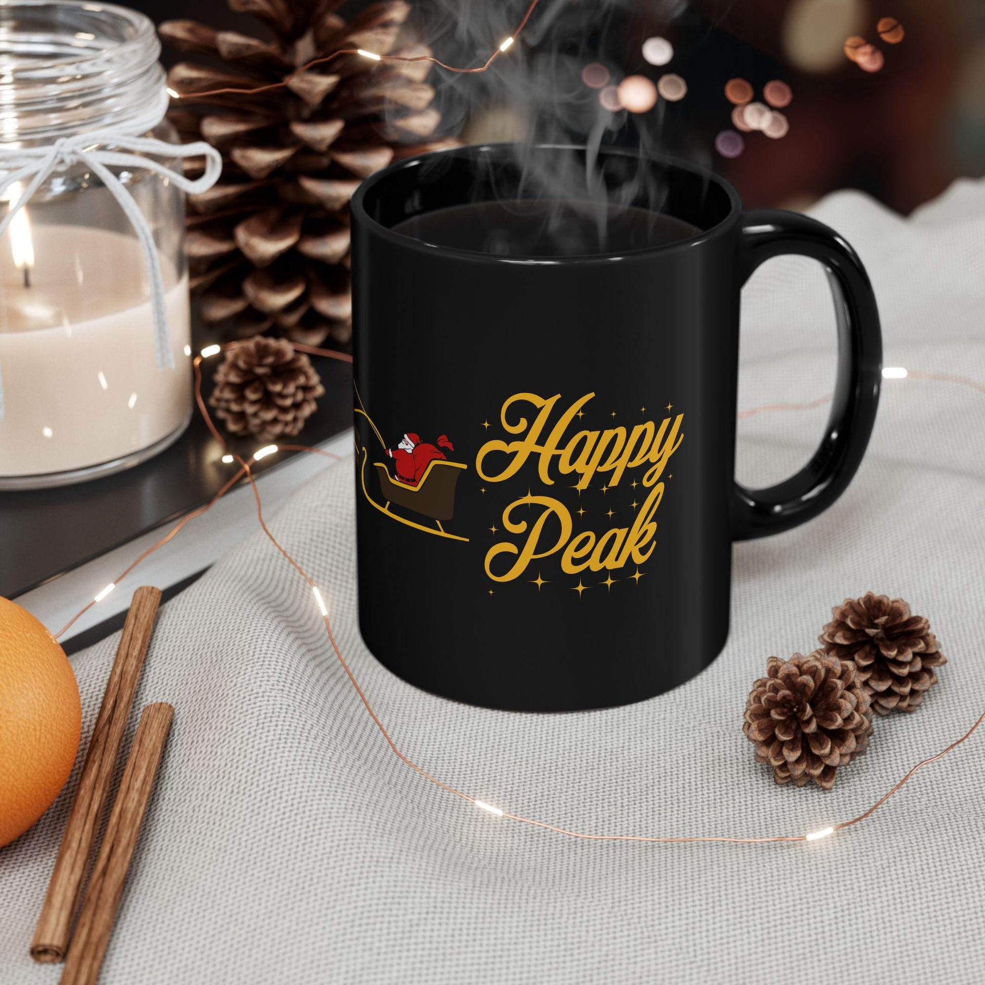 Black UPS Santa Mug with Happy Peak design and Santa riding UPS delivery fleet, 11oz ceramic cup, on counter UPS gift