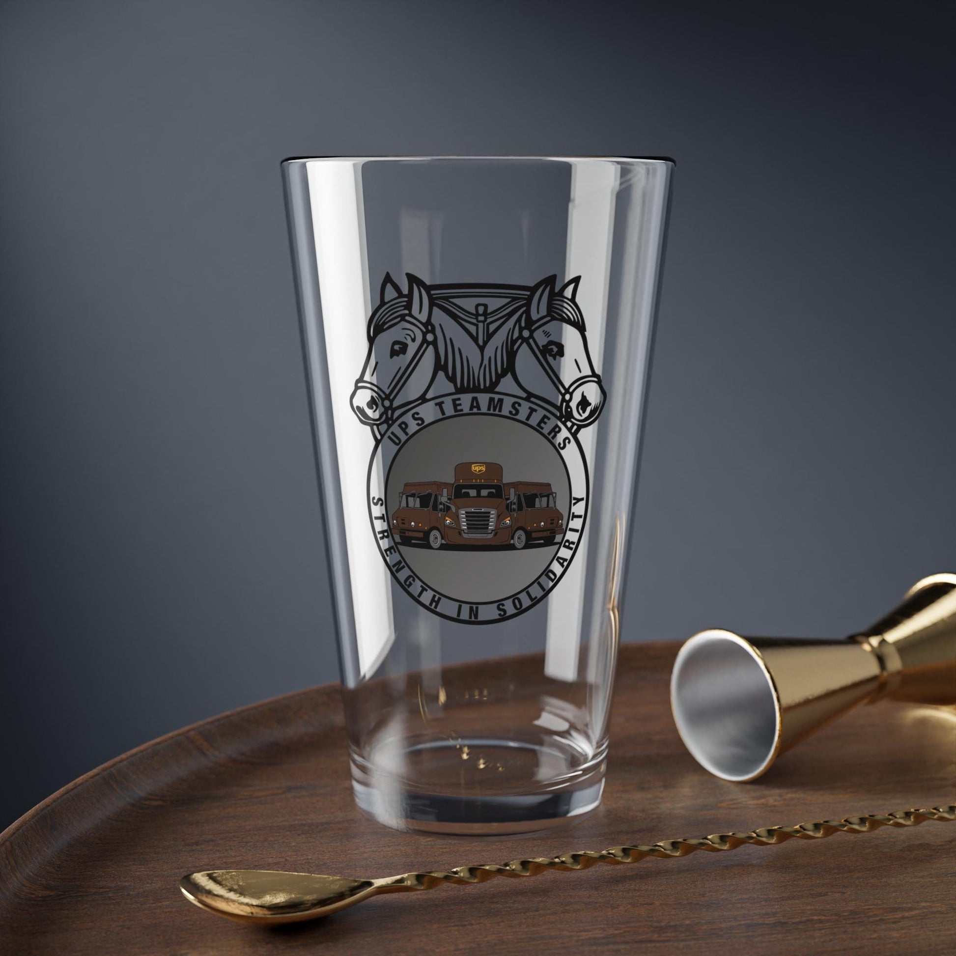 Clear 16oz UPS Teamsters pint glass with union emblem Teamster logo with UPS trucks